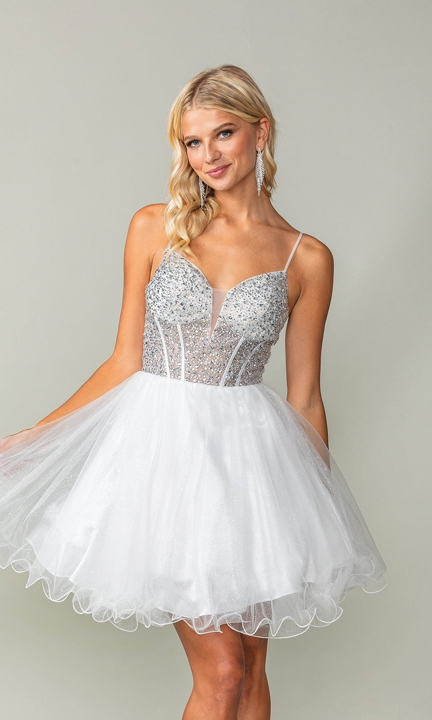 A woman models the Beaded Corset Short A-Line Homecoming Dress 3353, showcasing its sparkly beaded bodice and flared tulle skirt against a plain light background.